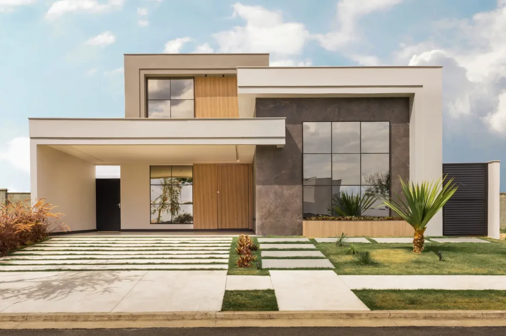 sober living homes depicting a contemporary two-story house with clean lines and a landscaped front yard.